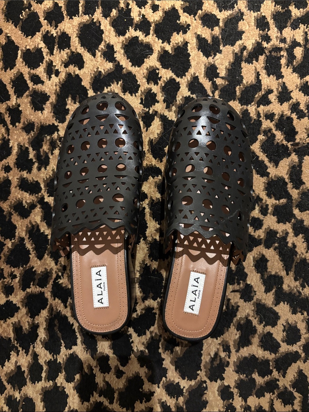 Alaia Black Laser-Cut Leather Slip-On Mules